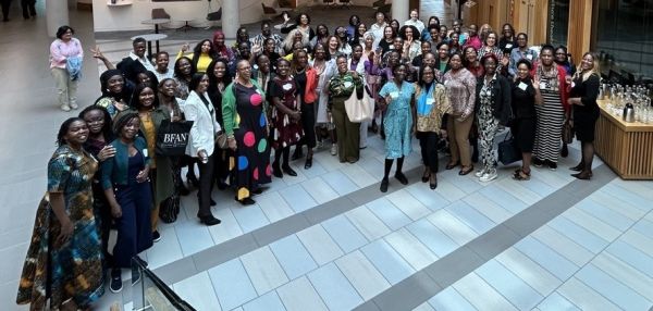 A large group of BFAN members in the Nexus atrium.