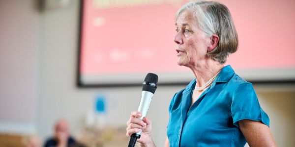 Professor Dame Angela McLean giving her keynote speech in the Esther Simpson building.