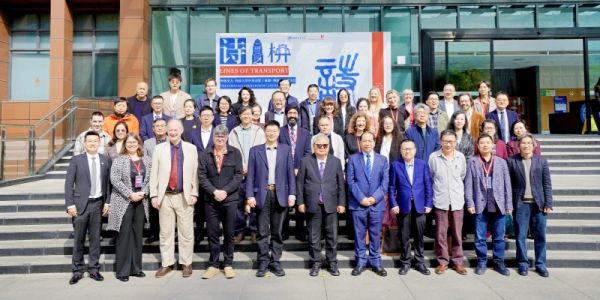 The delegation from the UK and China grouped together outside the conference venue.