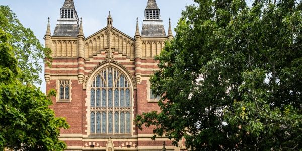 The Great Hall with trees in full bloom