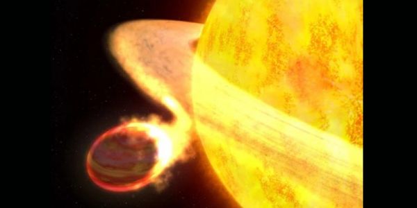 艺术家提出的一个金色系外行星的概念，其周围有一个环，螺旋状向其恒星移动。