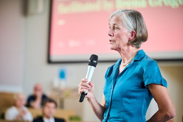 A close-up of Professor Dame Angela McLean addressing the audience in Leeds