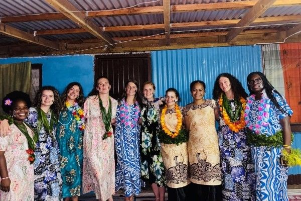 A group of people before the meke (a traditional dance) in Fiji.
