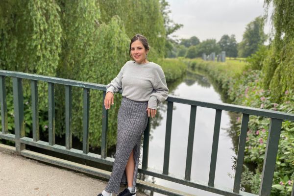 Alma Palacios on a bridge in a park in Leeds.
