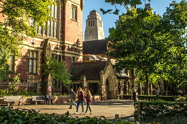 Students walk through campus.