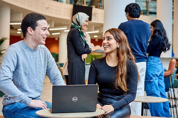 Two students sat in the Union cafe.