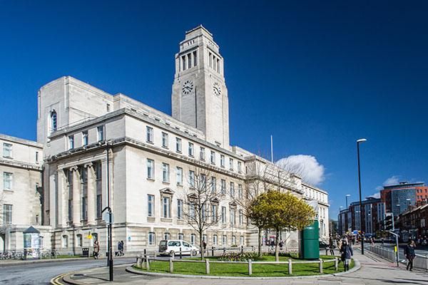 A side view of the Parkinson Building under a blue sky