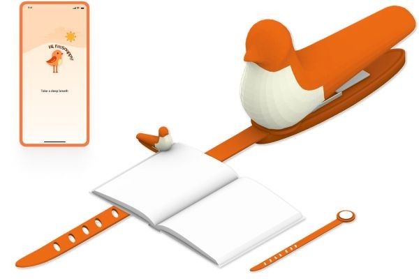 An image showing a mobile phone screen with the Snapchat logo, a book with the orange Snapmark bookmark and orange biodata bracelet.