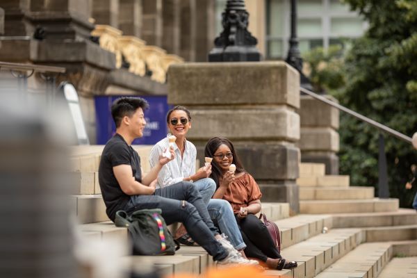 Students sat on some steps.
