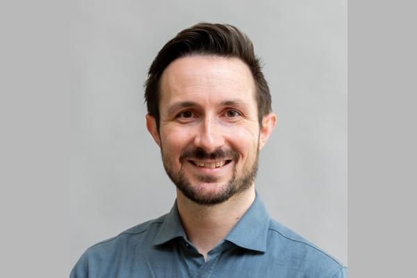 A head and shoulders images of Dr Toby Davies