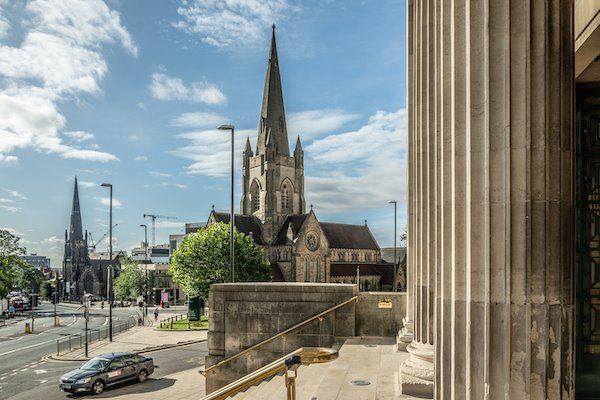 The Emmanuel Centre and its spire can be seen with the Parkinson building steps in the foreground.