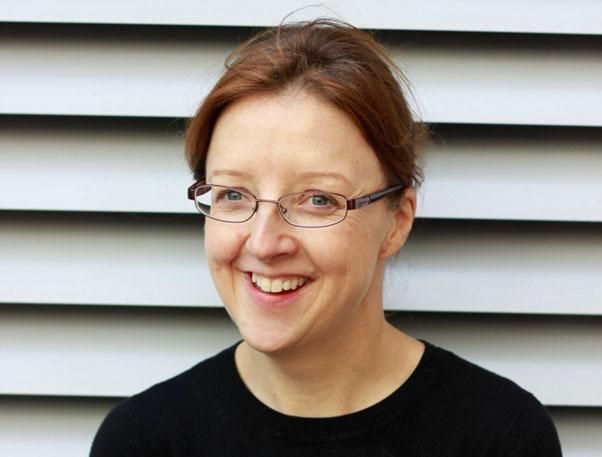 Head and shoulders shot of person with glasses