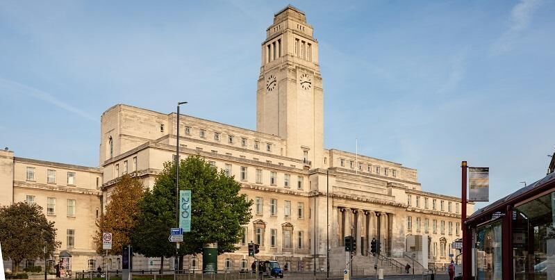 Parkinson Building at the University of Leeds under a blue sky.