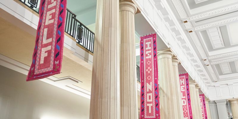 Quilt banners hang in Parkinson Court