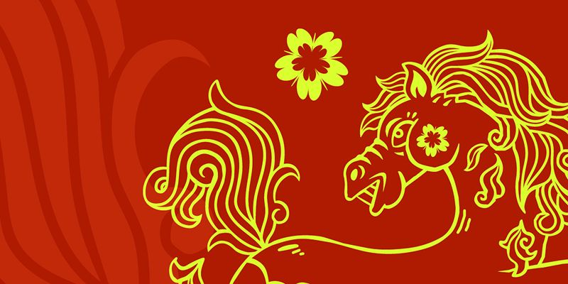 A drawing of a golden horse on a red background