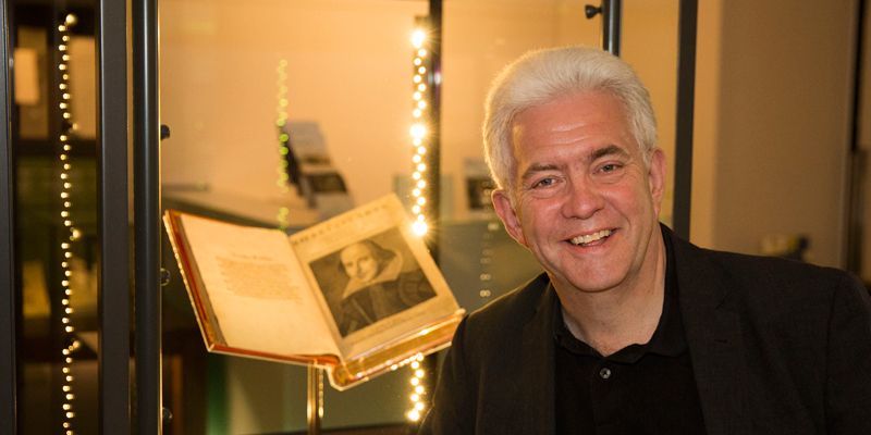 Poet Ian McMillan with the First Folio in the Treasures of the Brotherton Gallery.