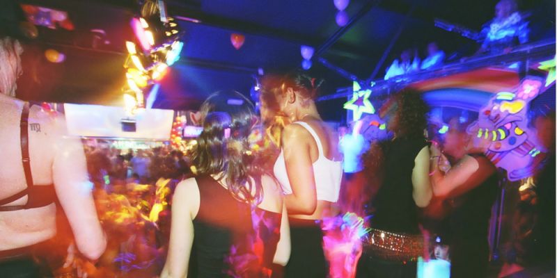 A club night in Leeds, with colourful lights and overlays.