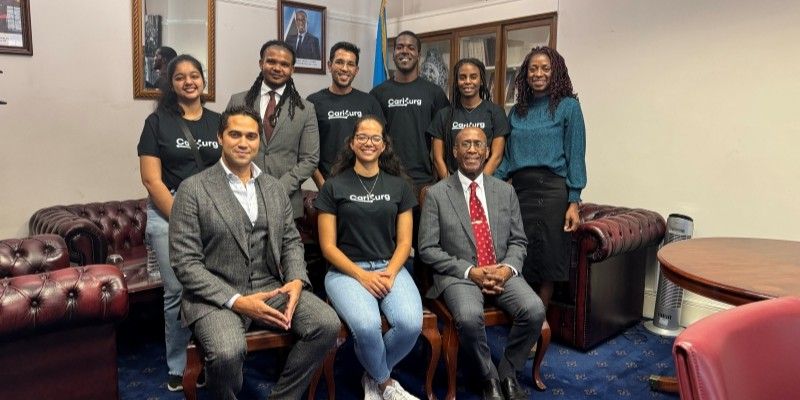The four students with His Excellency Anthony B. Severin, Dr. Jonathon Noel and Dr. Nikita Greenidge. 