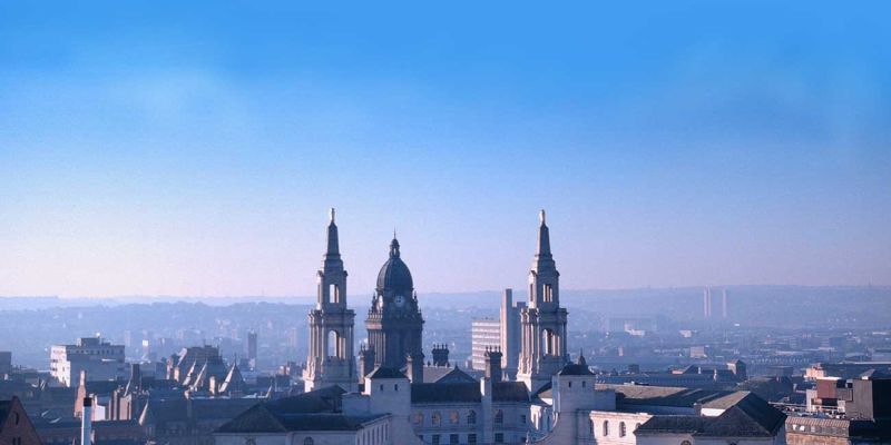 Leeds skyline showing buildings and blue sky