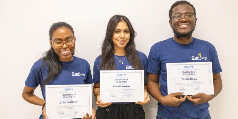 Chioma Okafor, Renita Bharatsingh and Orville Daley with their certificates. 