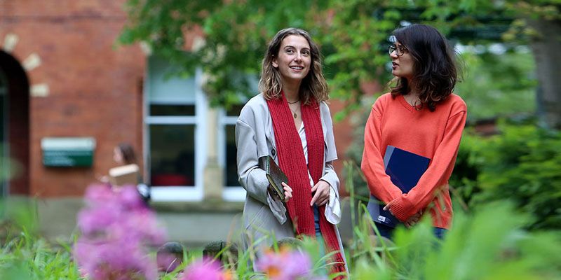 Postgraduate students outside Clothworker's Court