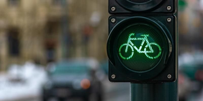 A green cycling traffic light