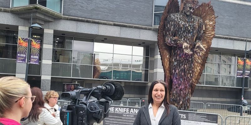 Sarah being interviewed by ITV at the launch of the Knife Angel in Leeds