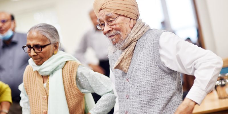 An older couple dance in a dance class