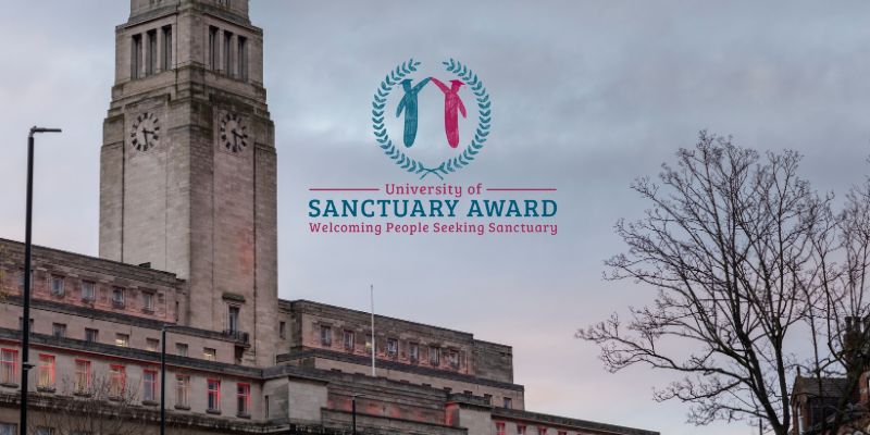 The Parkinson Building clock tower with the University of Sanctuary Award logo overlaid on the image. The logo reads 'welcoming people seeking sanctuary'.