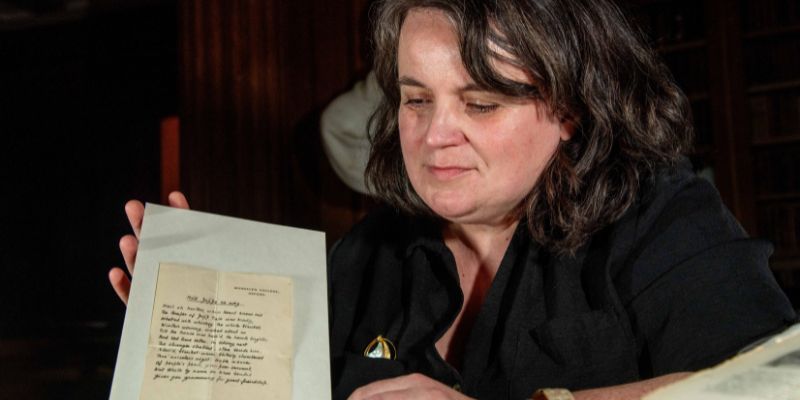 Literary archivist Sarah Prescott carefully holds 'Mód Þrýþe Ne Wæg', a handwritten manuscript by CS Lewis