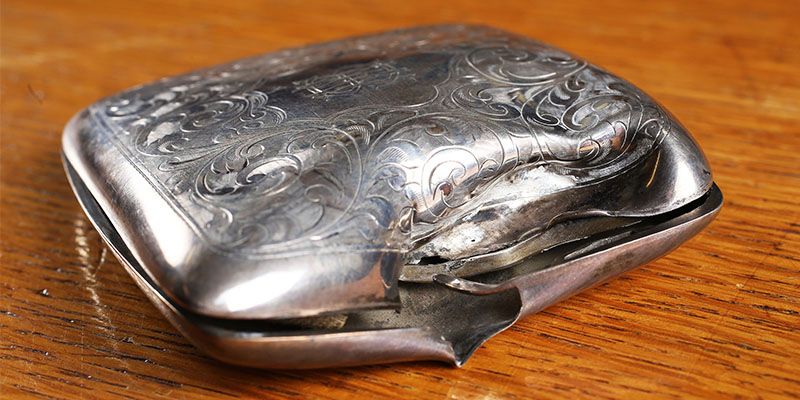 William Macdonald's shattered cigarette case
