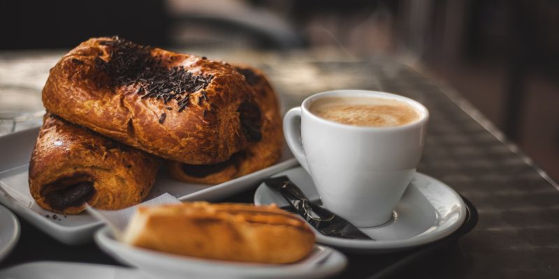 A breakfast of pastries and coffee