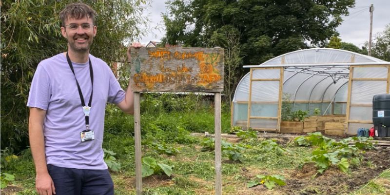 Dr Ian Shaw next to the pumpkin patch at CATCH