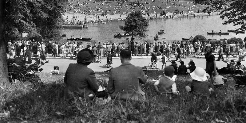 Image shows a crowd watching a cricket match at Roundhay Park in 1944