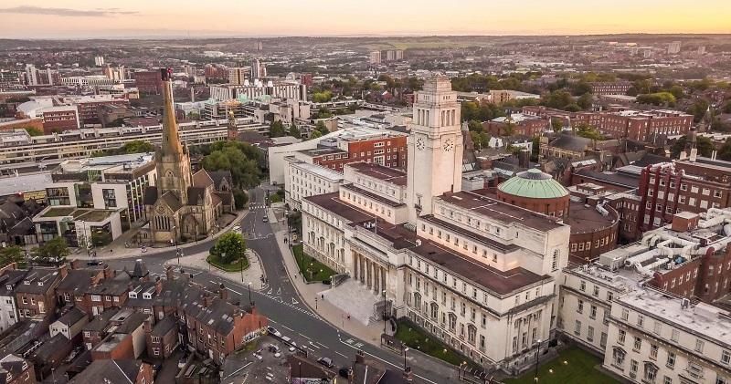Aerial view of the University of Leeds campus featuring the Parkinson Building.