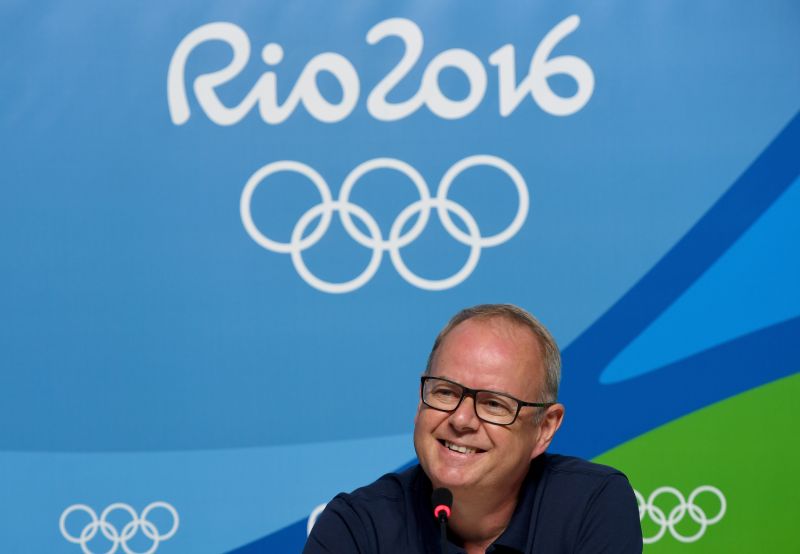 Mark England answers questions in a press conference at Rio 2016