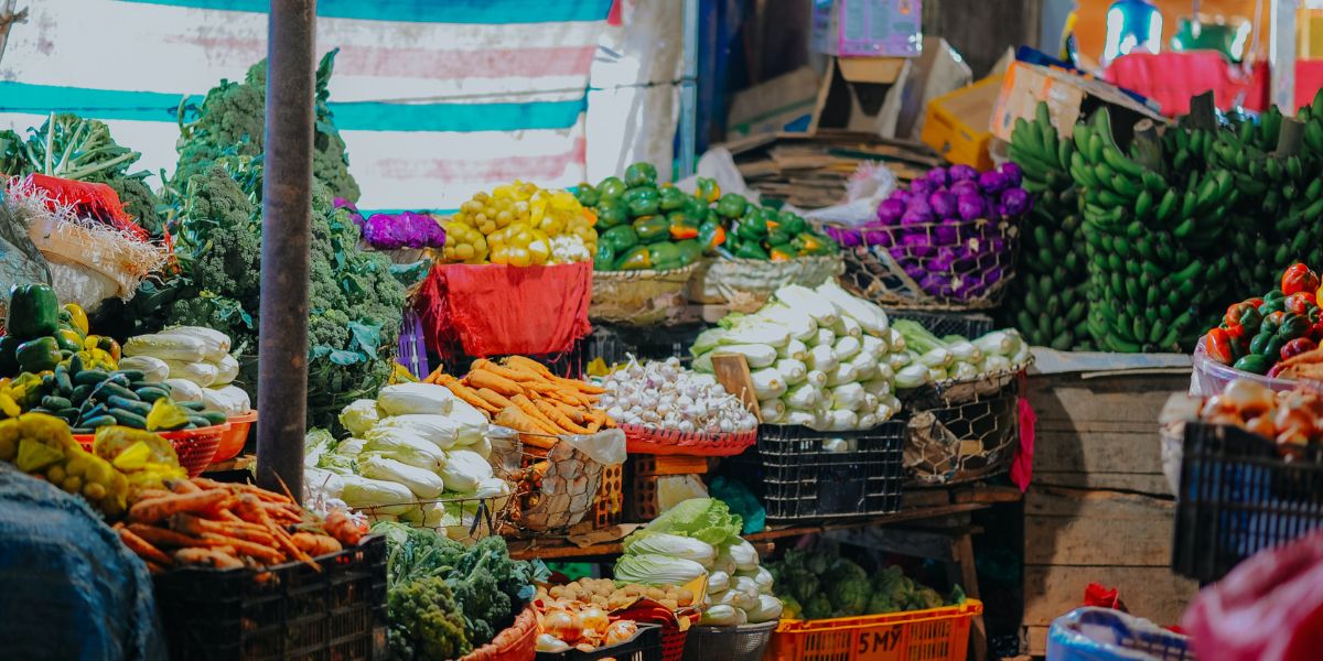 An array of colourful fruit and vegetables at a market