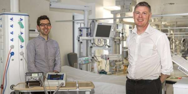 The picture shows Dr Pete Culmer, left, and Dr David Brettle, standing by a sleep apnoea machine