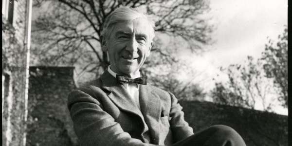 black and white photo of Sir Herbert Read sitting outside
