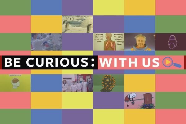 Be Curious with us holding card