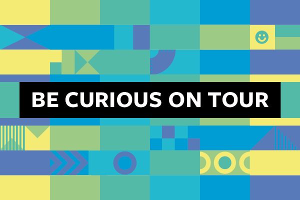 The text Be Curious: On Tour on a green, blue and yellow background with circular shapes.