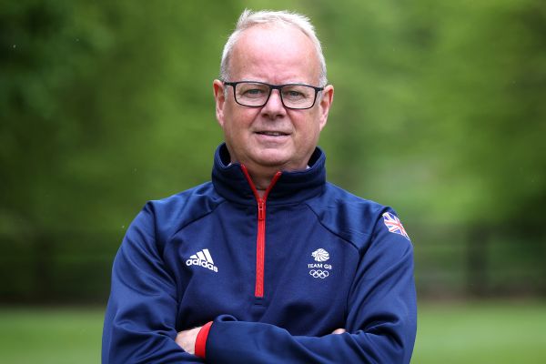 Mark England poses in Team GB tracksuit