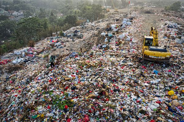Picture of landfill with a digger