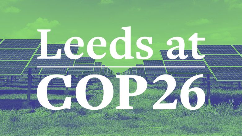 A solar panel array in a field with the words Leeds at COP26 overlaid
