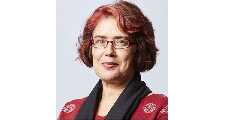 Head and shoulders photo of Professor Cristina Leston-Bandeira against a pale background