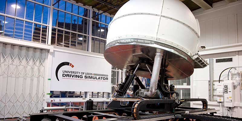 The large, white, spherical exterior of the University of Leeds Driving Simulator.