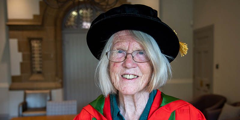 Portrait of Eleanor Joy Dodson in graduation gown and cap.