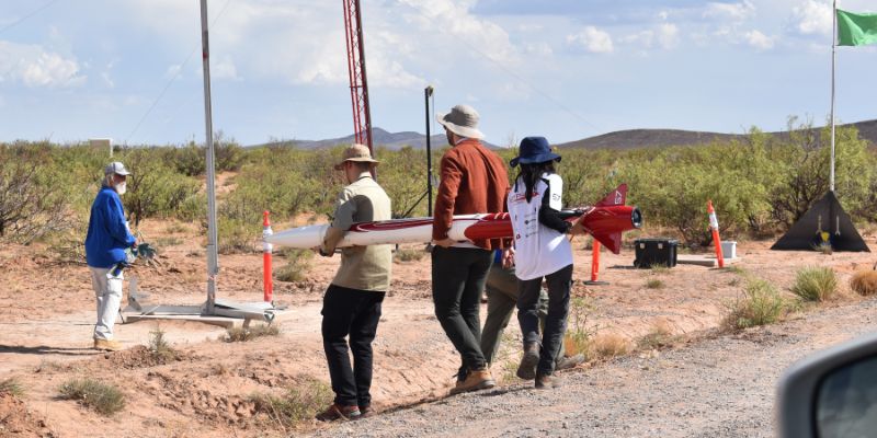 students carry Gryphon I to launchpad in New Mexico
