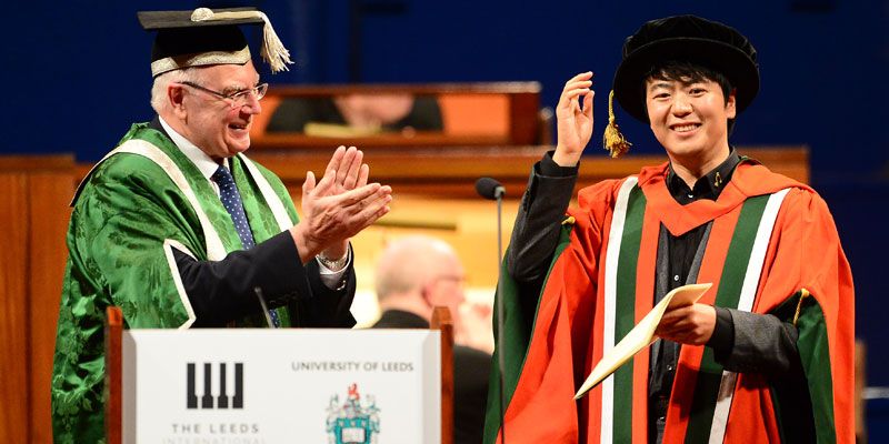 Lang Lang, Global Ambassador of the Leeds International Piano Competition receiving his honorary Doctor of Music degree from University of Leeds Vice-Chancellor Alan Langlands at the finals of the competition on Saturday 15 September.