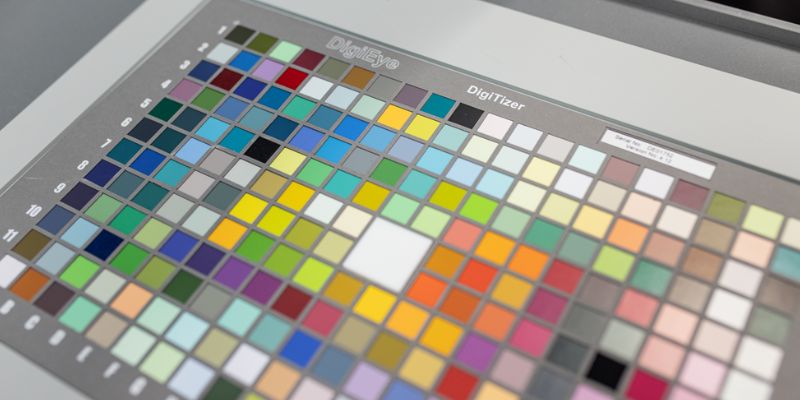 Colour board with multiple small square blocks of colours. Labelled DigiEye, DigiTizer.